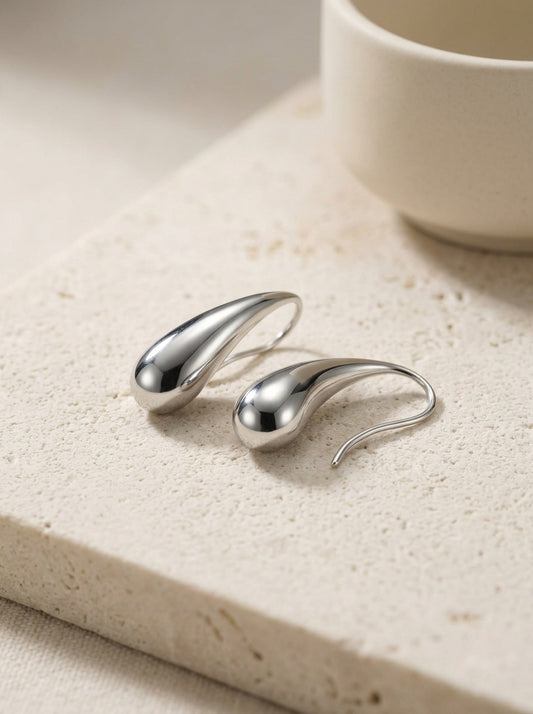 Lova elongated silver hoop earrings