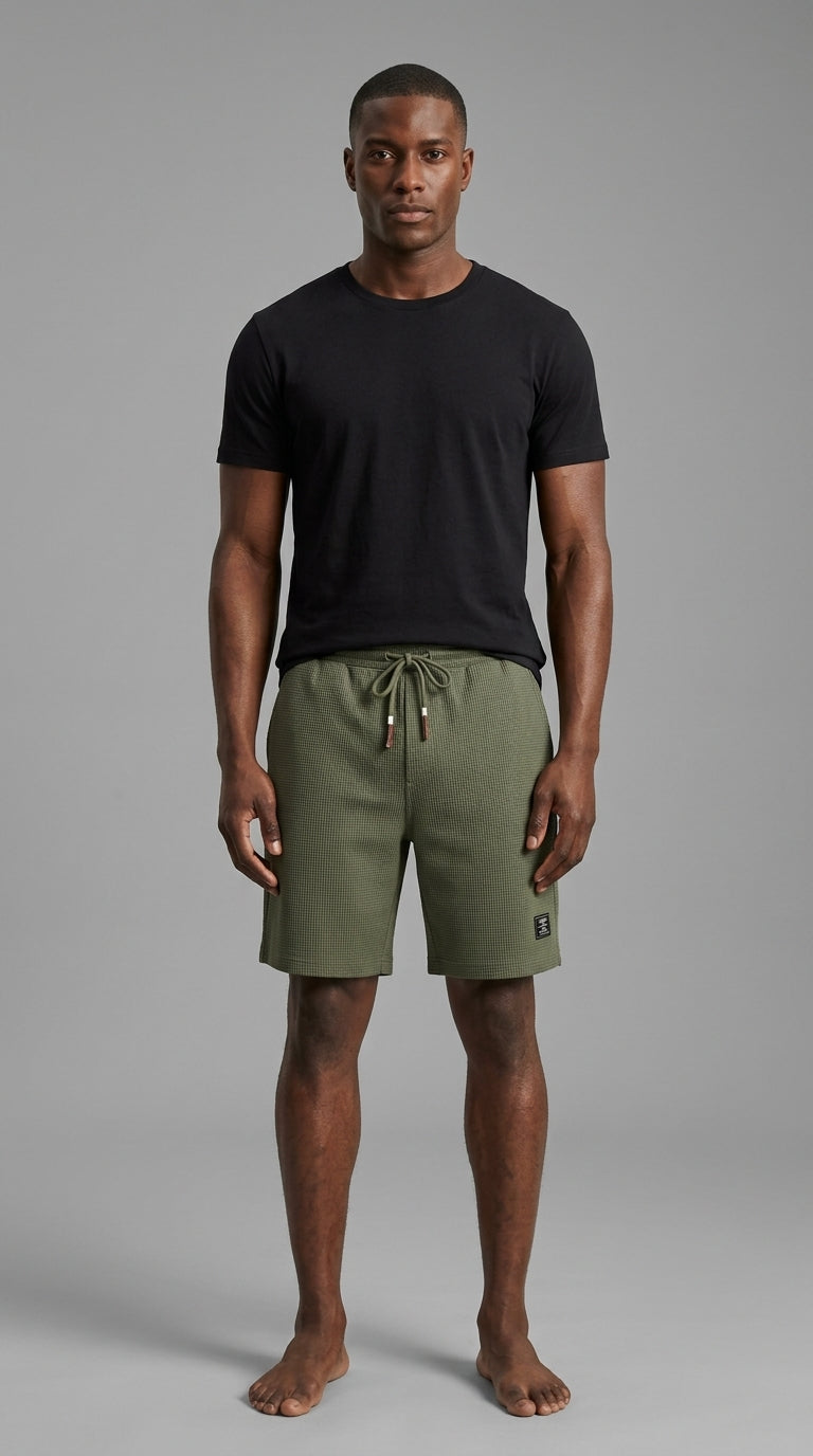 Man wearing Pierre shorts and t-shirt