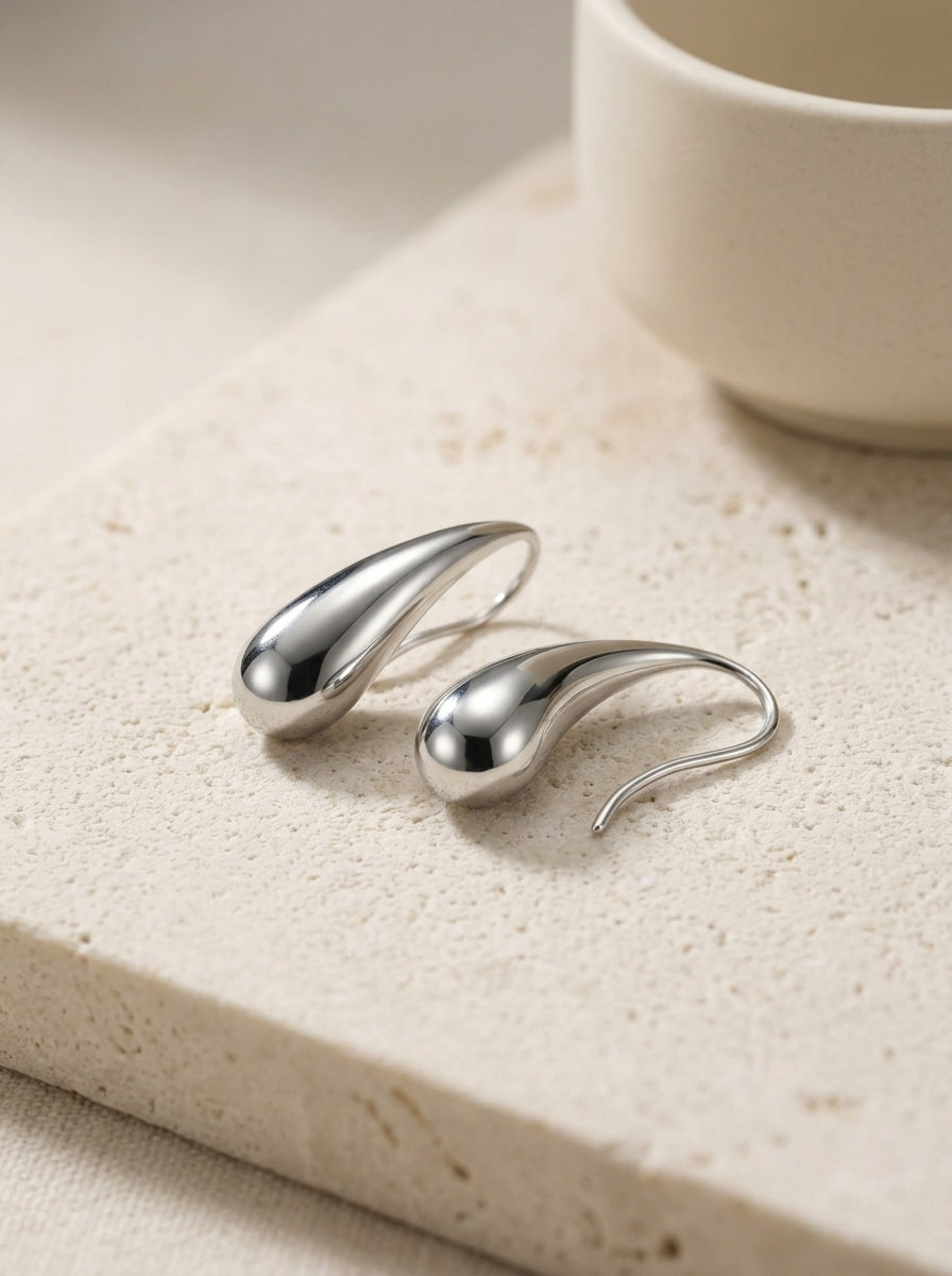 Lova elongated silver hoop earrings