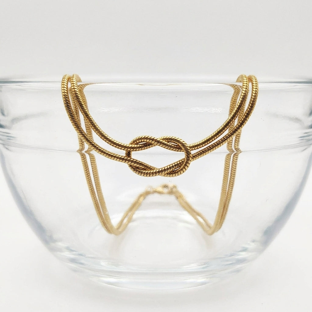 Mira gold knotted necklace detail