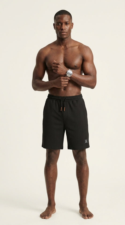 Man wearing Pierre shorts, studio shot