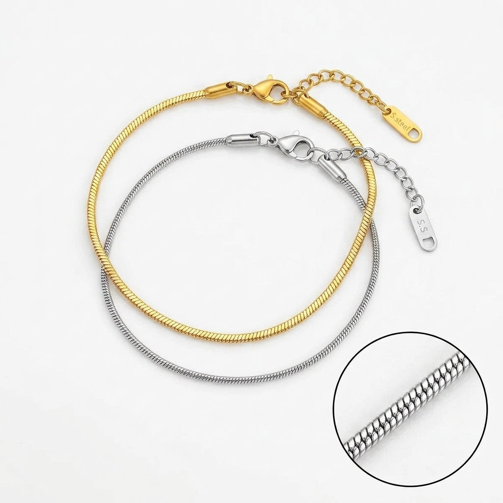 Rafe snake chain bracelets on a white surface