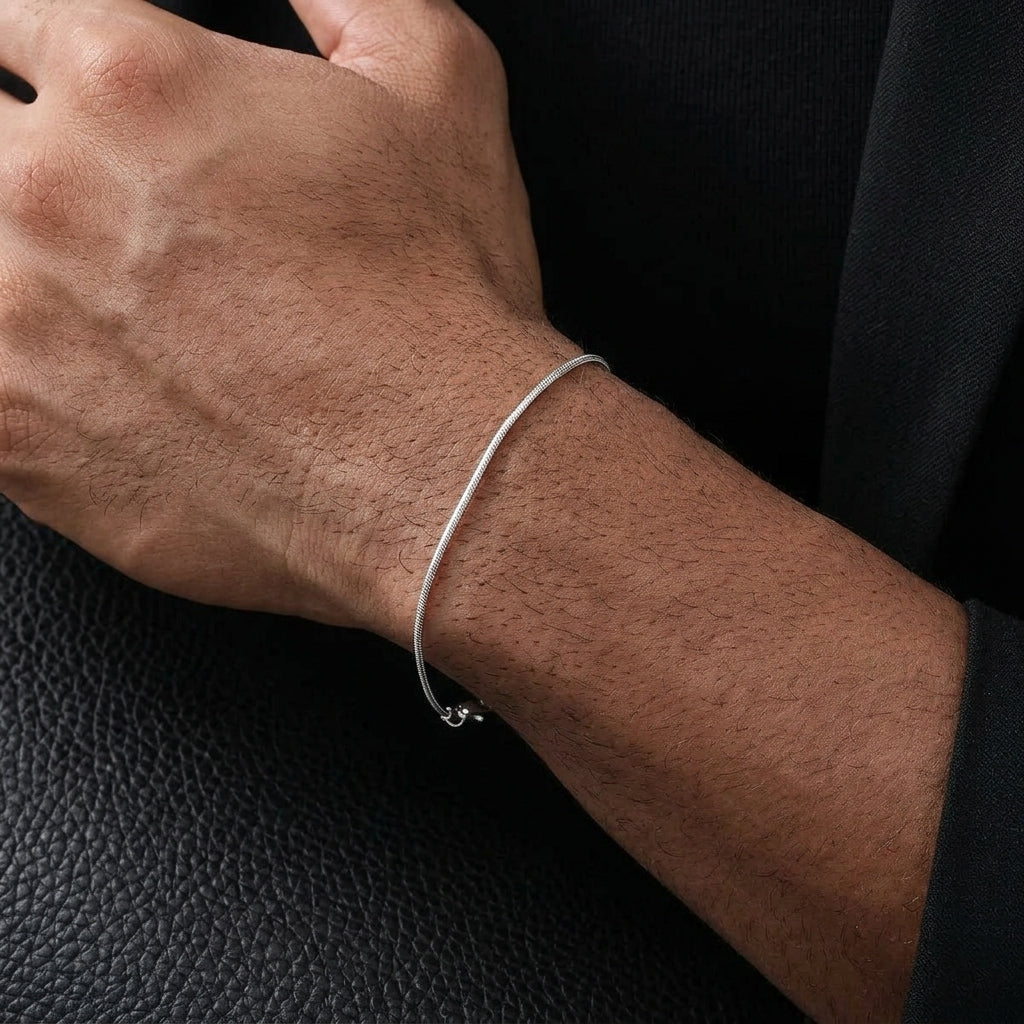 Man wearing Rafe silver chain bracelet