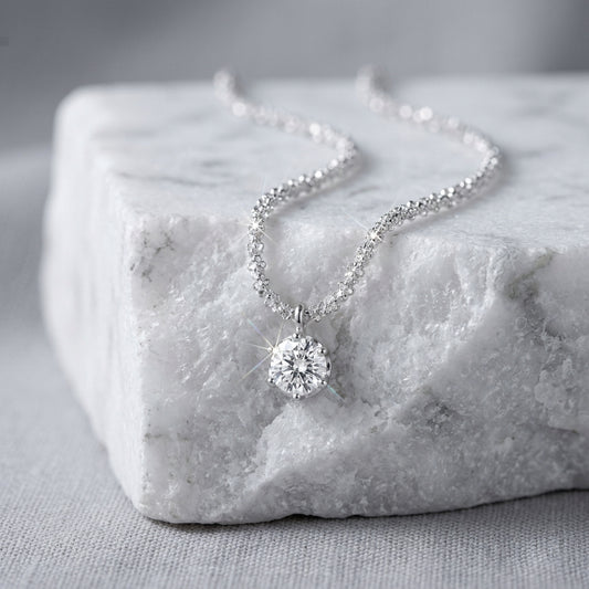 Vera sterling silver zircon necklace on marble