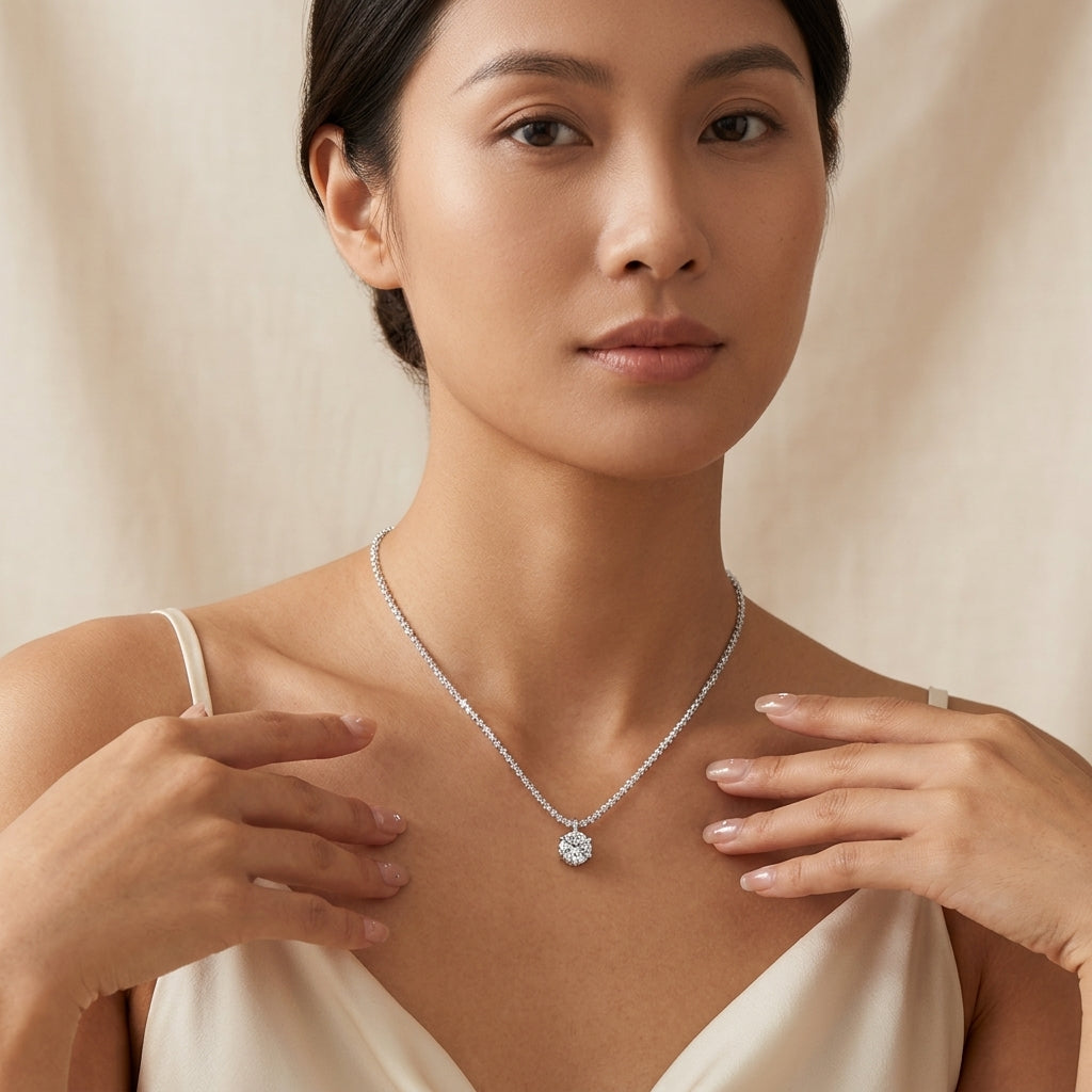 Vera sterling silver necklace worn at the collarbone