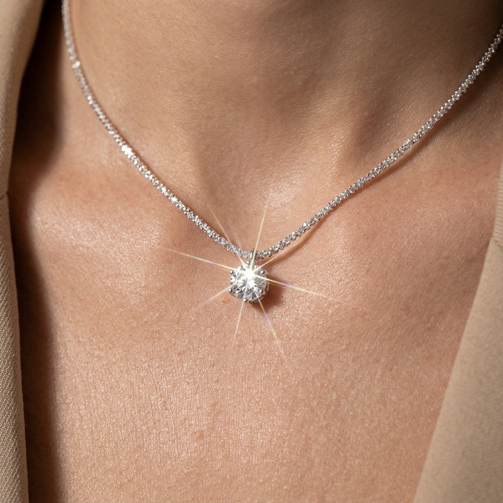 Woman wearing Vera sterling silver necklace